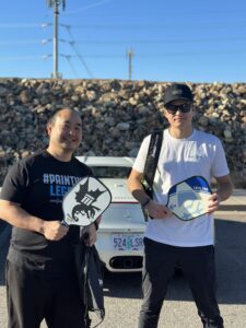 Marko Sipilä presenting an award to a partner